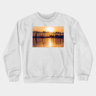 Orange Sundown Behind Long Wooden Bridge in Mandalay, Burma Crewneck Sweatshirt